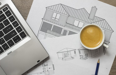 Blueprints and laptop