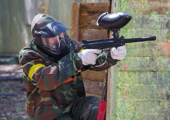Fototapeta premium Paintball player aiming