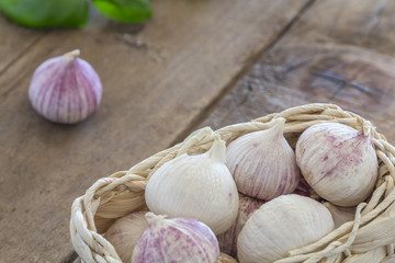 garlic cloves in a basket
