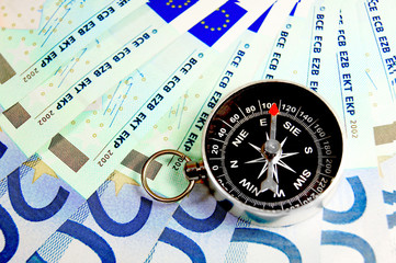 Compass and money.