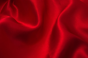 red satin or silk fabric as background