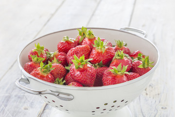 Strawberries in a sieve