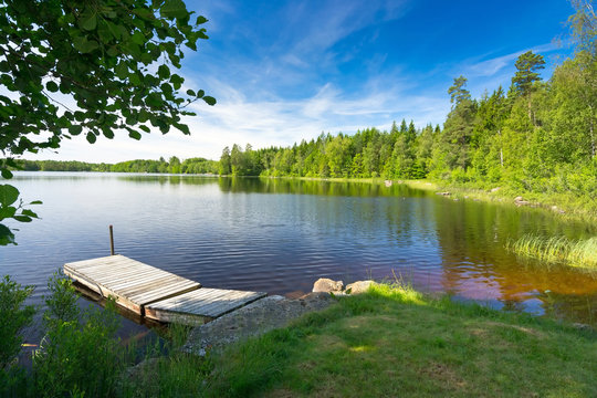 Summer Swedish lake in morning light