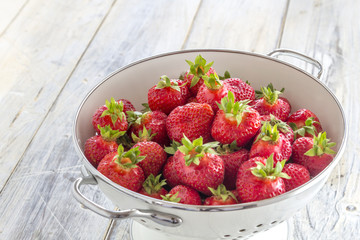 Strawberries in a sieve