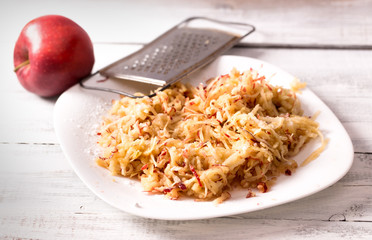 Grated apple on plate © Yingko
