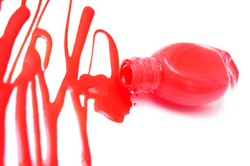 Red nail polish. On a white background.