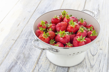 Strawberries in a sieve