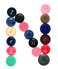 The alphabet from buttons for sewing.