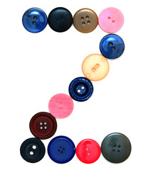 The alphabet from buttons for sewing.