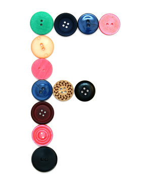 The alphabet from buttons for sewing.