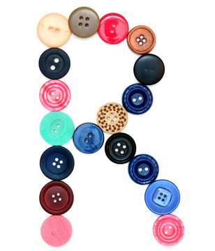 The alphabet from buttons for sewing.