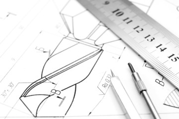 Compasses, ruler and the drawing.