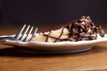 Slice of decadent chocolate whipped peanut butter cake