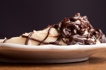 Slice of decadent chocolate and whipped peanut butter cake