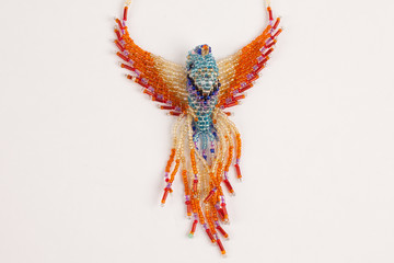 Intricately beaded fashion jewelry colorful exotic bird