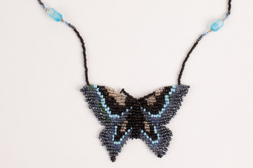 Intricately beaded fashion jewelry of an exotic butterfly necklace