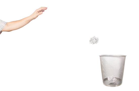 metal basket with crumple paper isolated on whte