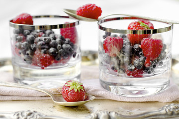 red fruits dessert with vintage silveware