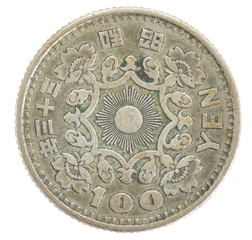 Old 100 japanese yen coin isolated on white