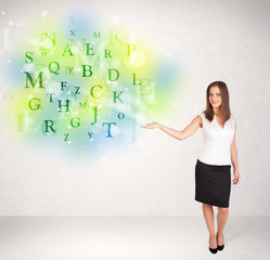 Business women with glowing letter concept