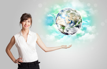 Young woman with earth and cloud concept