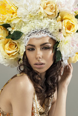 Beauty summer girl with flowers hair style and perfect make up