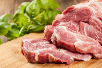 Raw pork on cutting board - 66520201