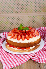 Delicious biscuit cake with strawberries