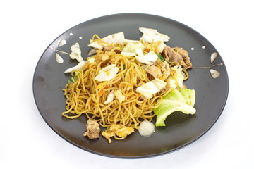 Chinese food stir - fried noodles with pork and vegetables
