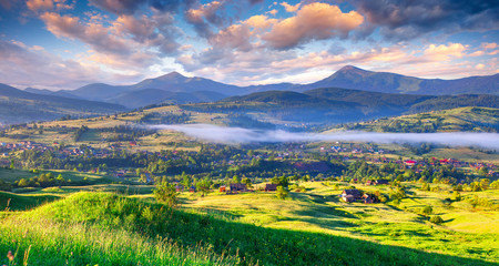 Beautiful summer landscape in the mountain village.