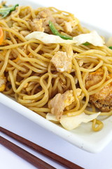 Chinese food stir - fried noodles with pork and vegetables