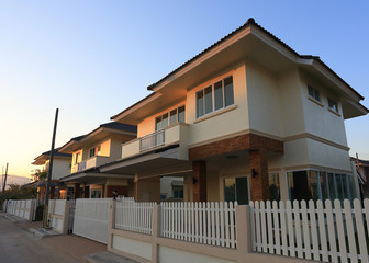 Big house modern style with sunshine and blue sky background