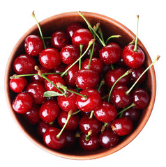 Cherries in color bowl isolated on white