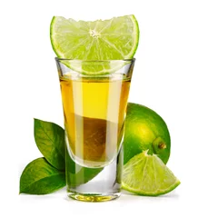 Foto auf Acrylglas Gold tequila shot with lime isolated on white © Serhiy Shullye