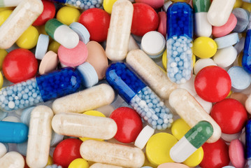 Color pills and capsules background