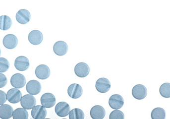 Blue pills background isolated on white