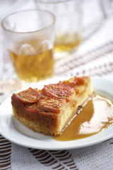 close up peach cake and peach sauce