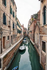 Fototapeta na wymiar Typical canal of Venice, Italy.