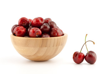 Bowl with ripe red cherries
