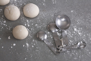 close up spoon and dough on table