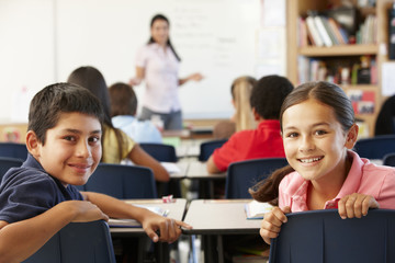 Teacher and schoolchildren in class