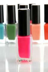 Group of bright nail polishes isolated on white