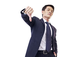 asian businessman thumb down, isolated on white