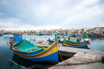 Fototapeta na wymiar Marsaxlokk with boats, Malta