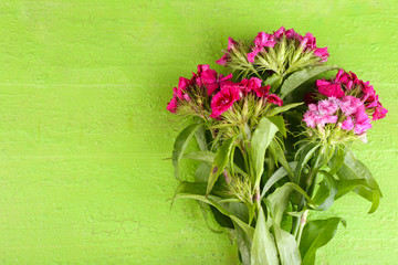 Beautiful bouquet on wooden background