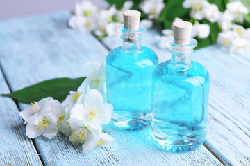 Spa composition with jasmine flowers on table close-up