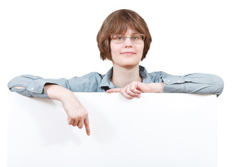 girl points on blank billboard isolated on white