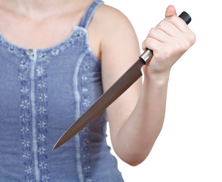 girl holding large kitchen knife