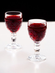 Cherry liqueur in crystal glasses