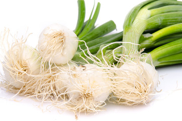 White onions with green stalks